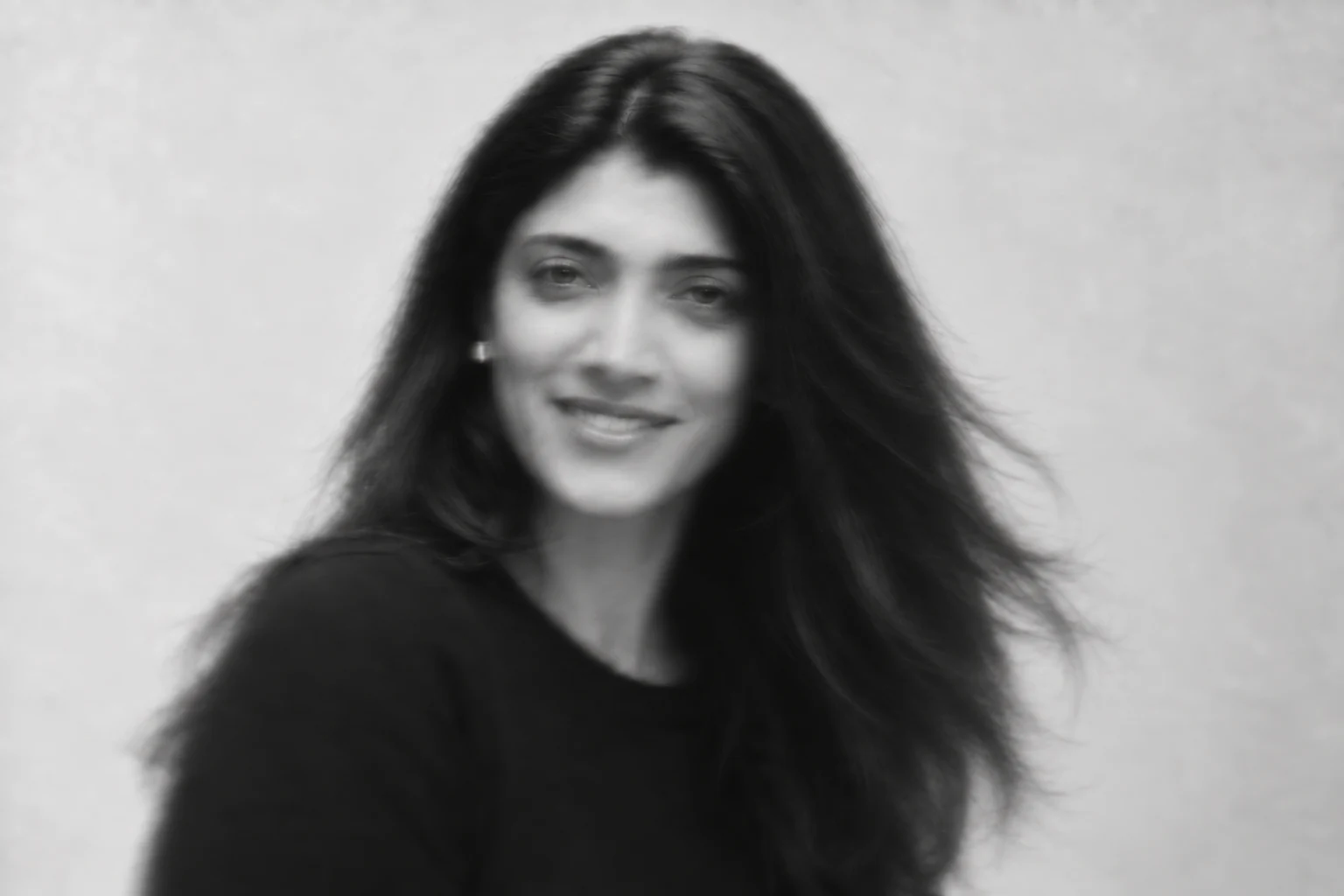 Black-and-white editorial portrait of Mônica Seiva